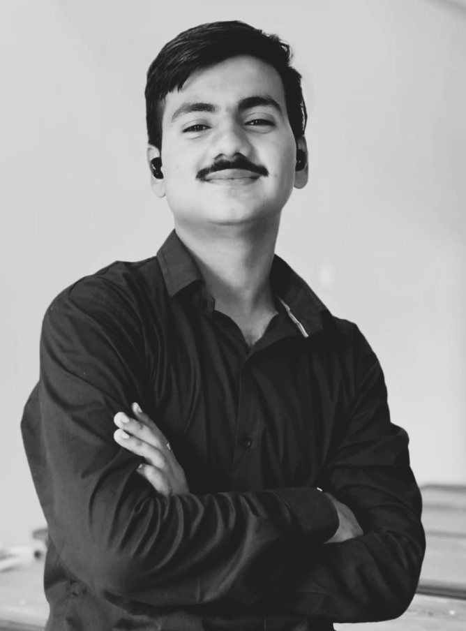 Professional UI/UX designer working on a modern laptop with creative interface design visible on screen